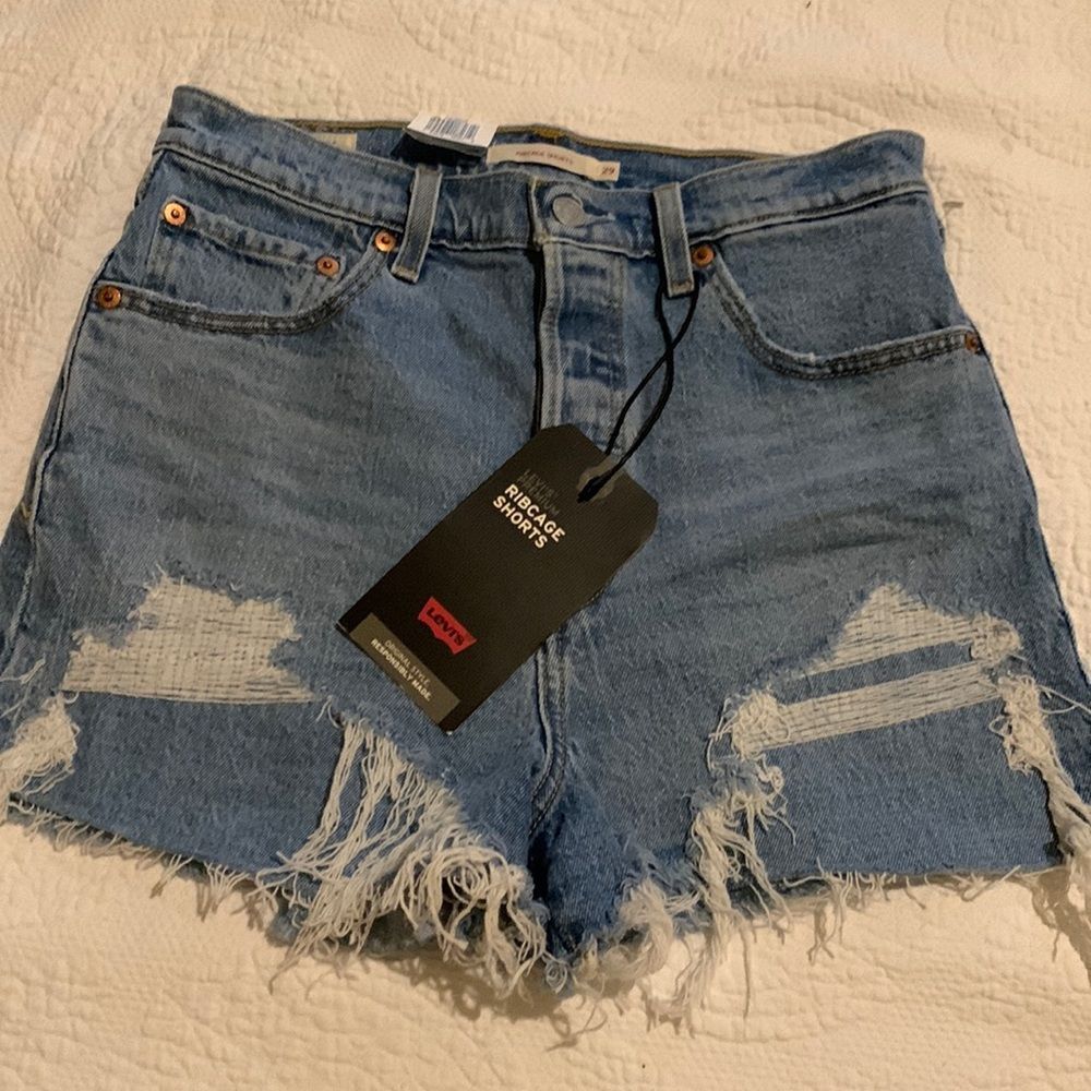 Levi premium rib cage shorts. Super high rise slim through the hips. NWT